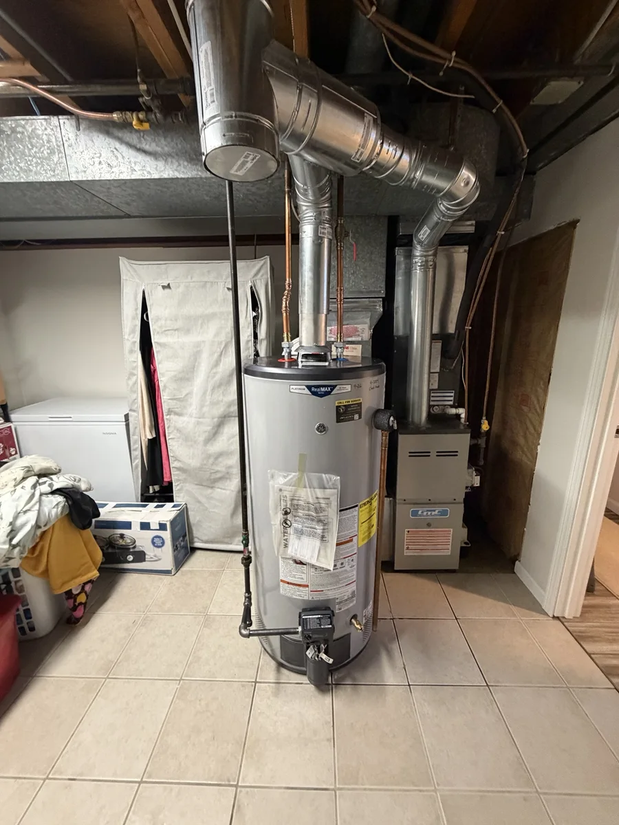 Completed GE RealMAX water heater installation by Sewer Masters